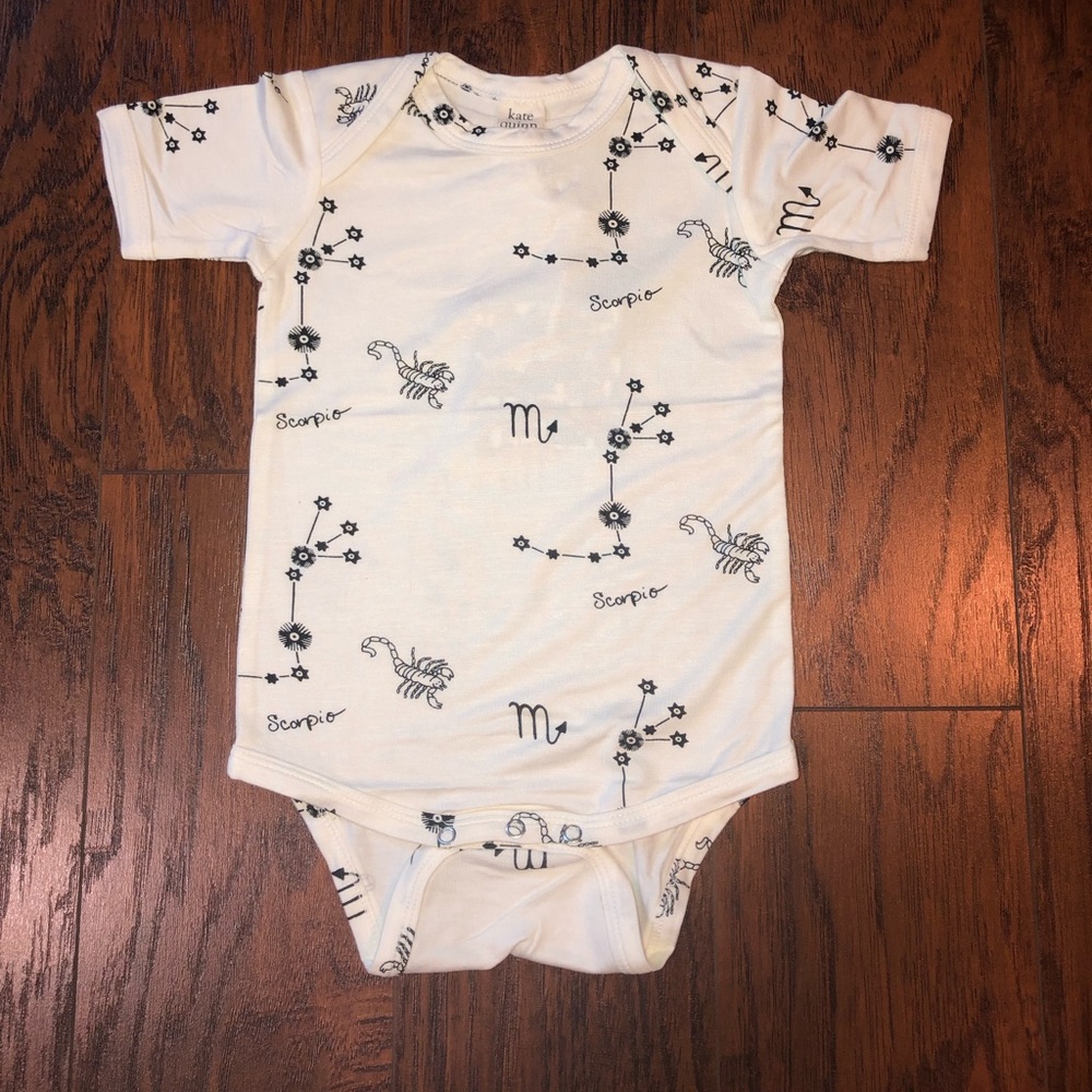 KATE QUINN ONESIE